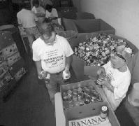 'Tons of Fun' volunteers sort canned goods