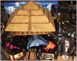 (levitating pyramid and glider next to guard)
